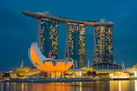 Marina Bay Sands illuminated at night, a highlight of this Singapore and Malaysia itinerary.