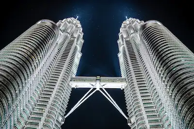 Petronas Twin Towers close-up at night – featured in our Kuala Lumpur 5 day itinerary with Malaya Travel.